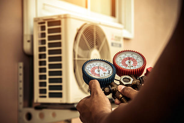 Professional Hvac technician working in West Branch, IA